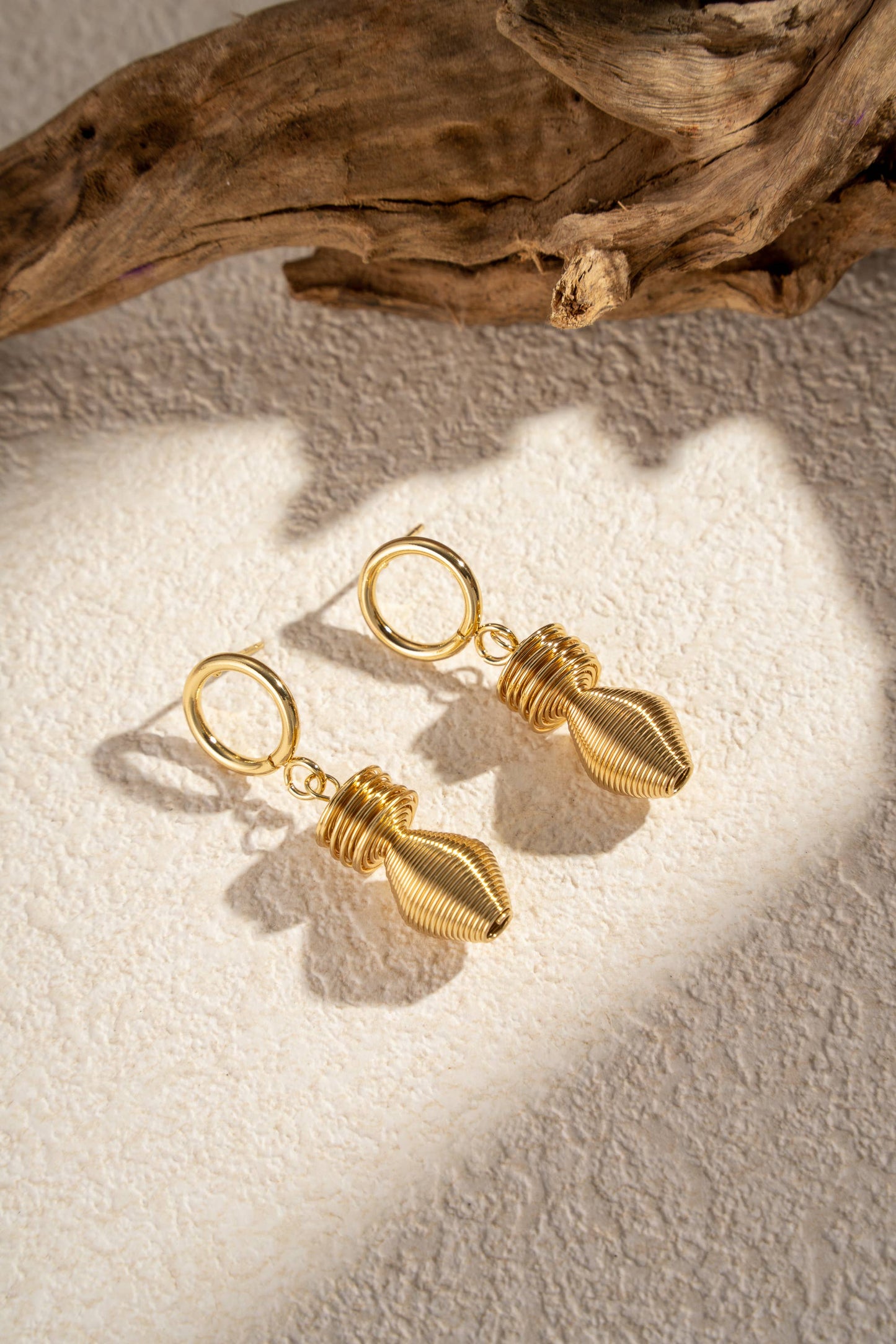 COSMOS - Twisted gold stainless steel earrings style