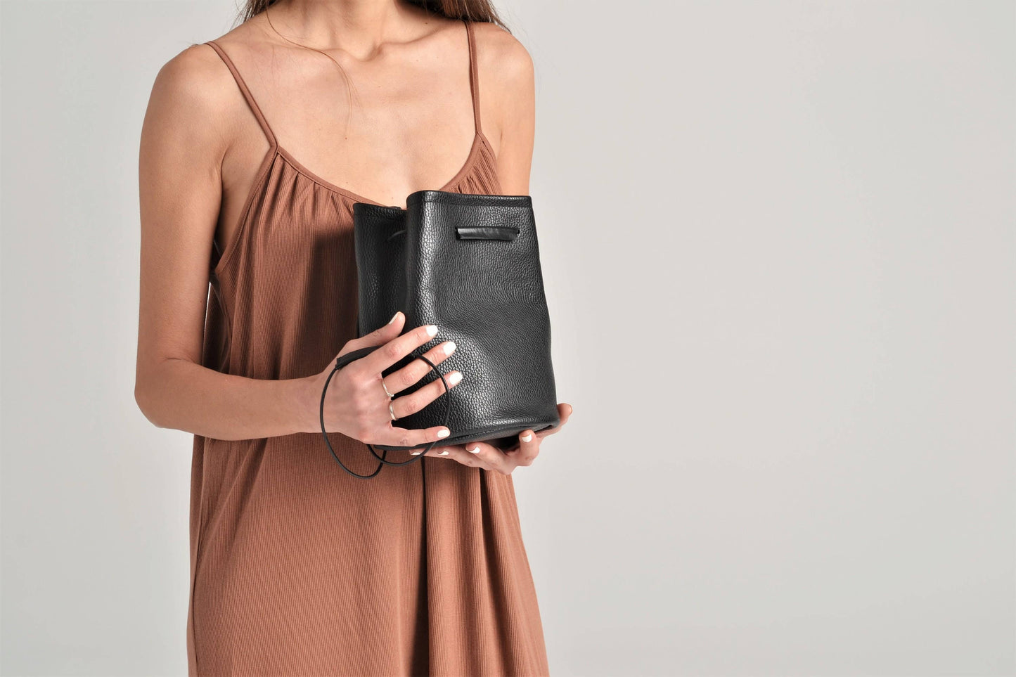 ANA KOUTSI - Ioli leather bucket bag in black