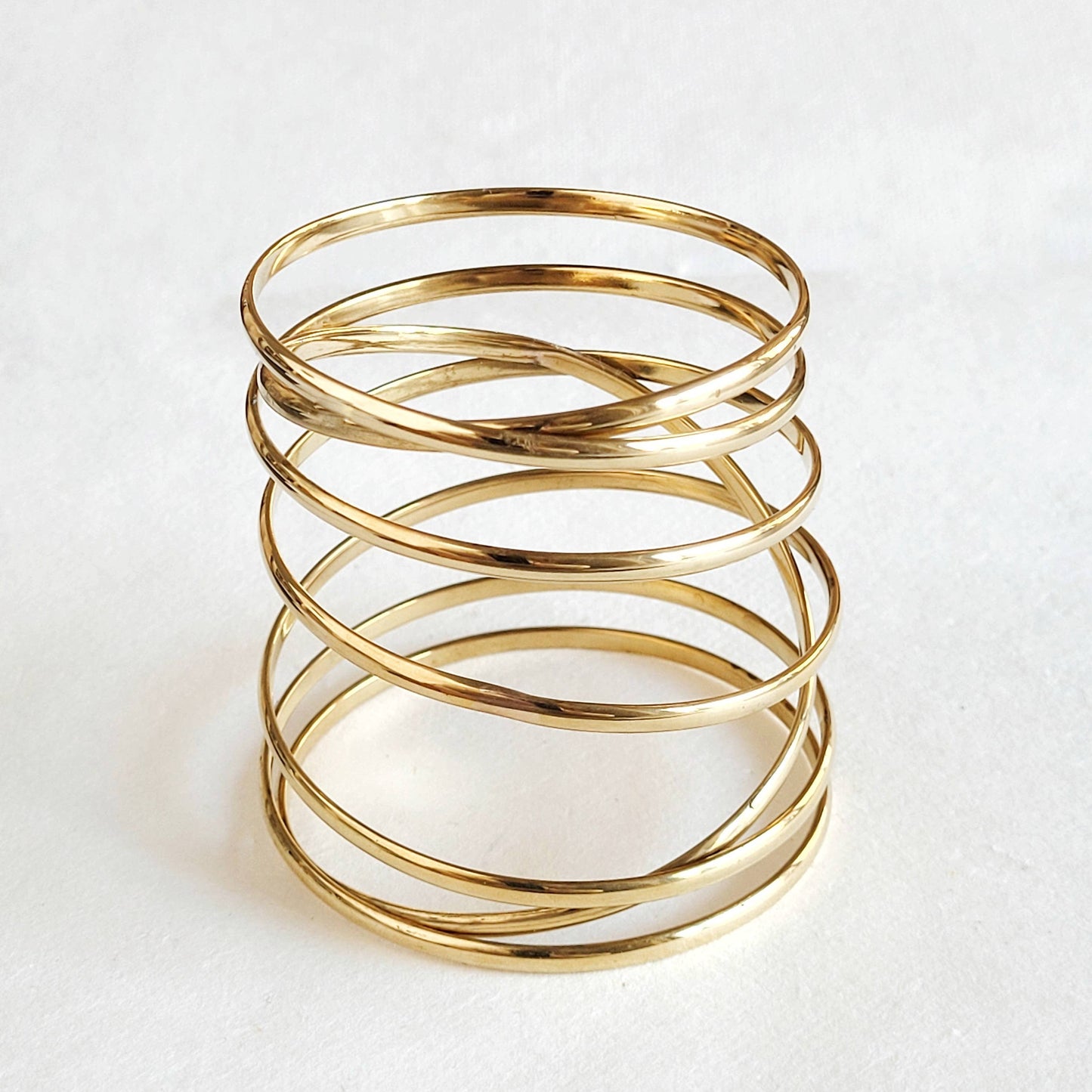 Bisjoux - Brass Infinity layered expanding Bangle bracelet: Silver