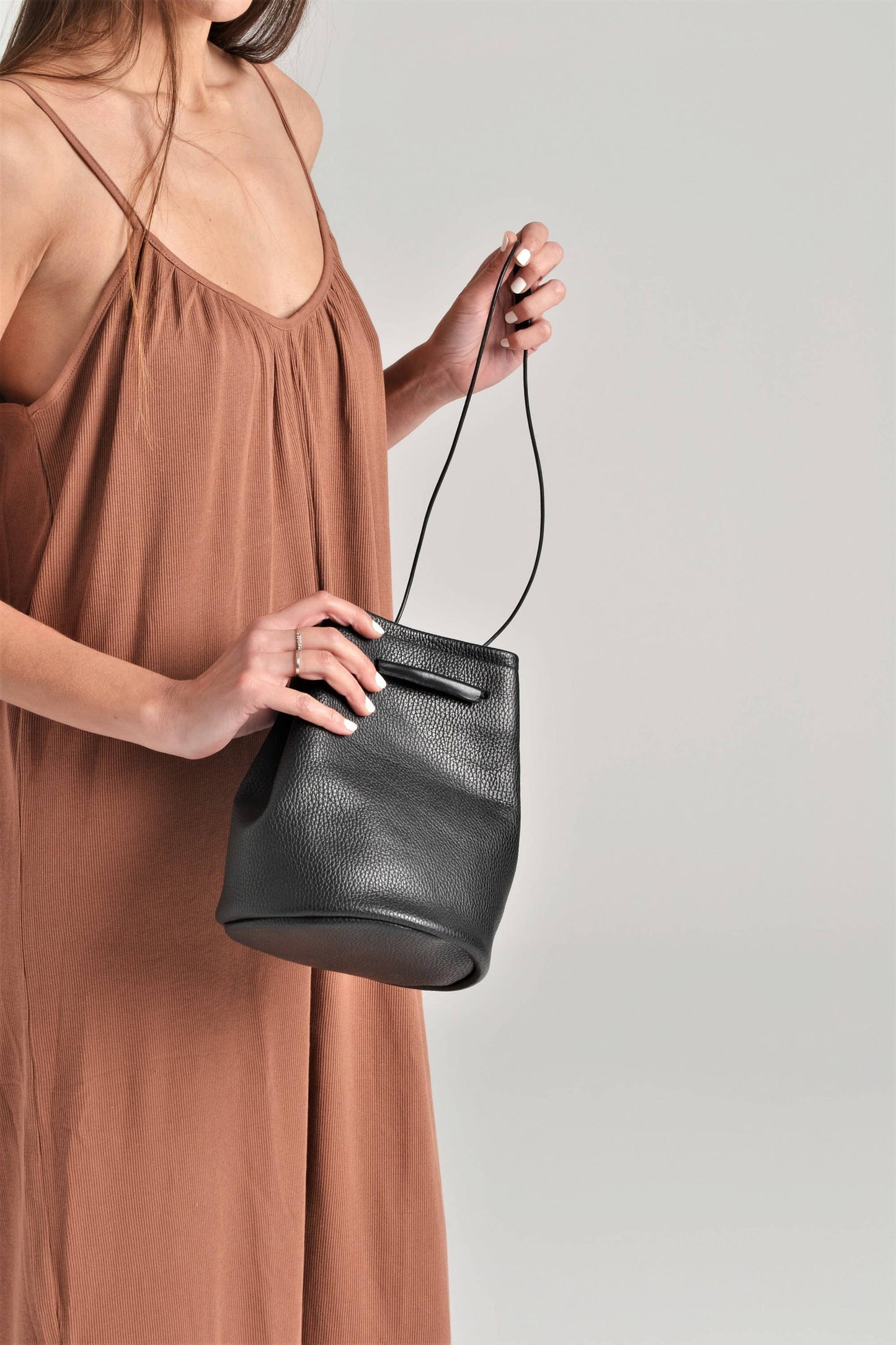 ANA KOUTSI - Ioli leather bucket bag in black