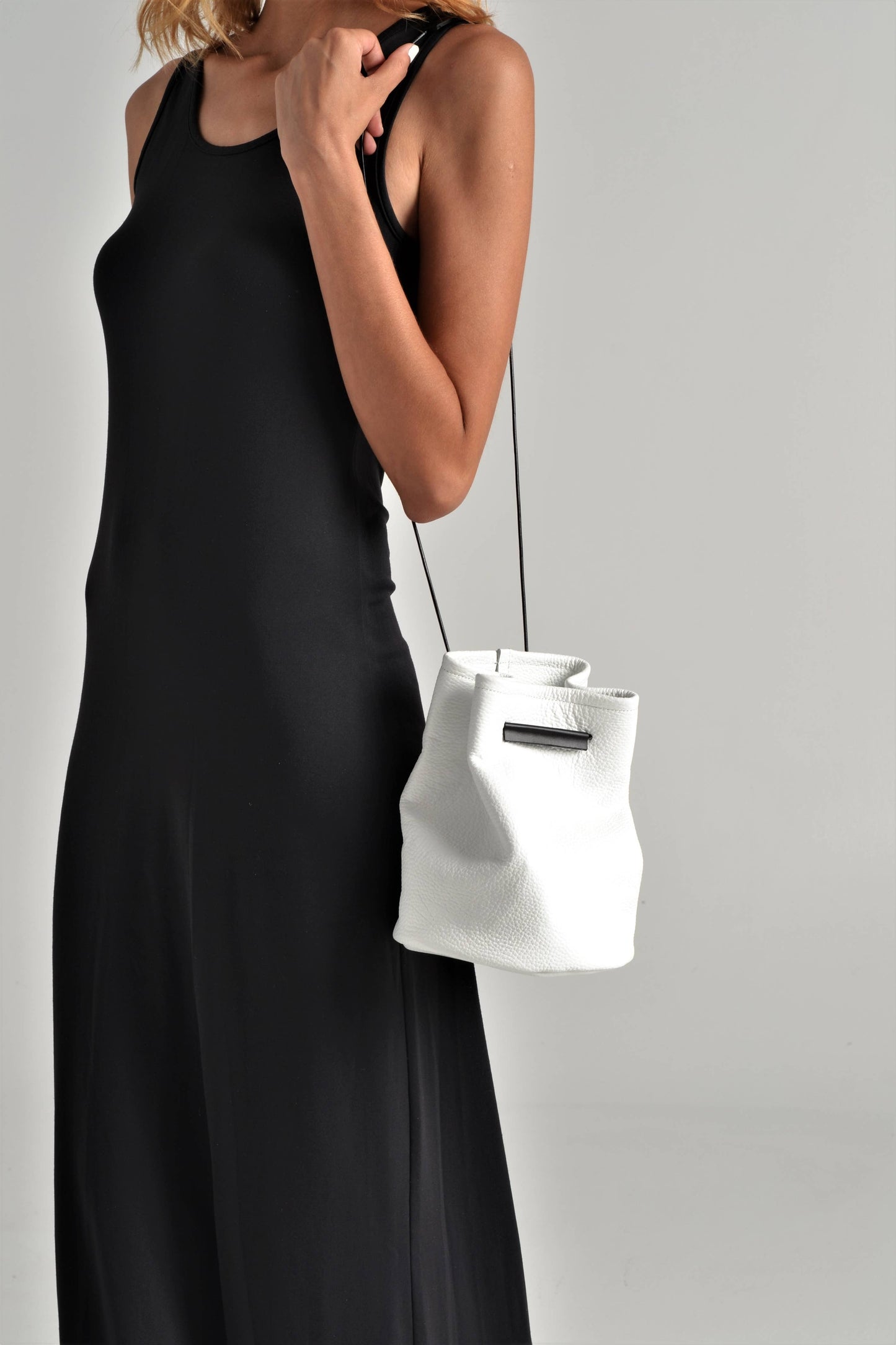 ANA KOUTSI - Ioli leather bucket bag in white