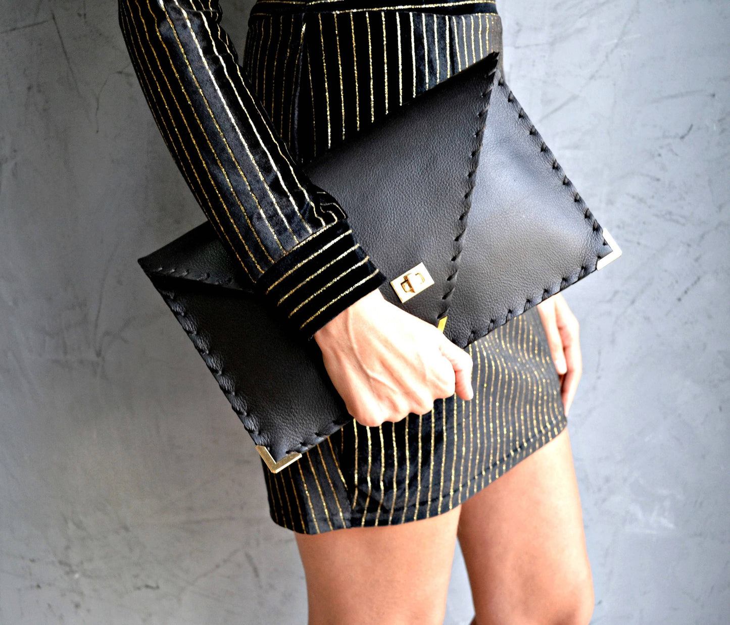 ANA KOUTSI - Symmetria black leather clutch bag: Silver / Small