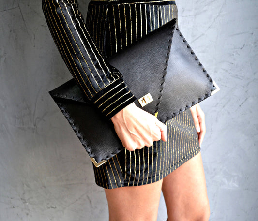 ANA KOUTSI - Symmetria black leather clutch bag: Silver / Small