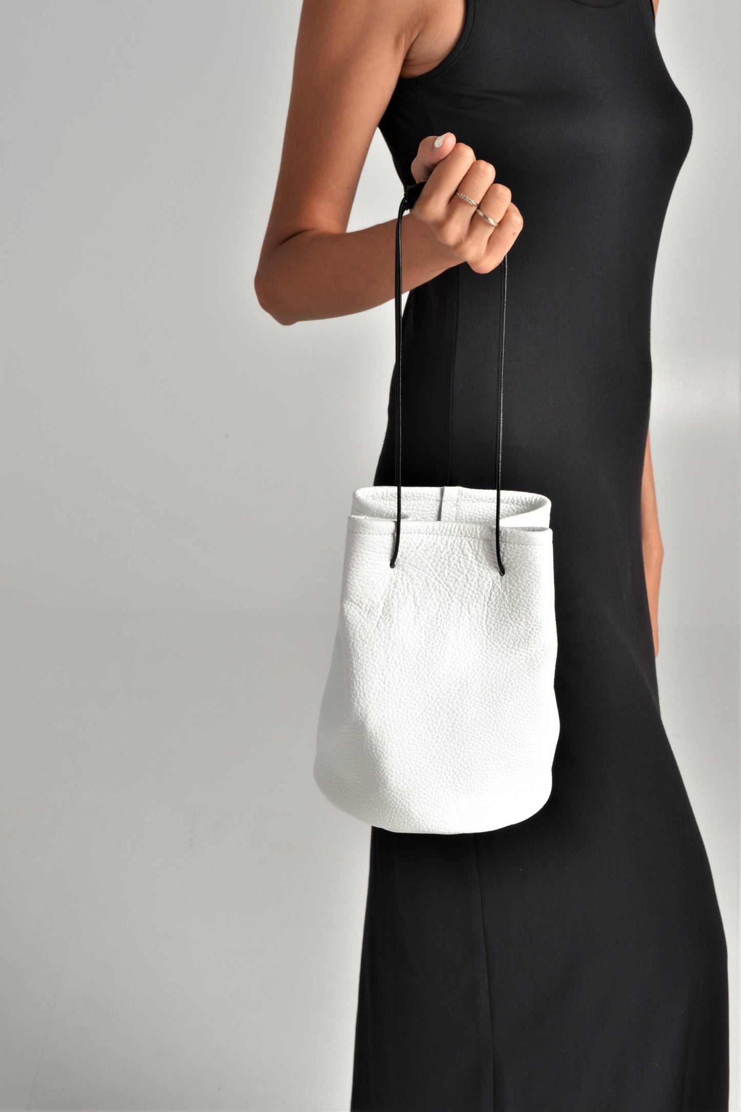 ANA KOUTSI - Ioli leather bucket bag in white
