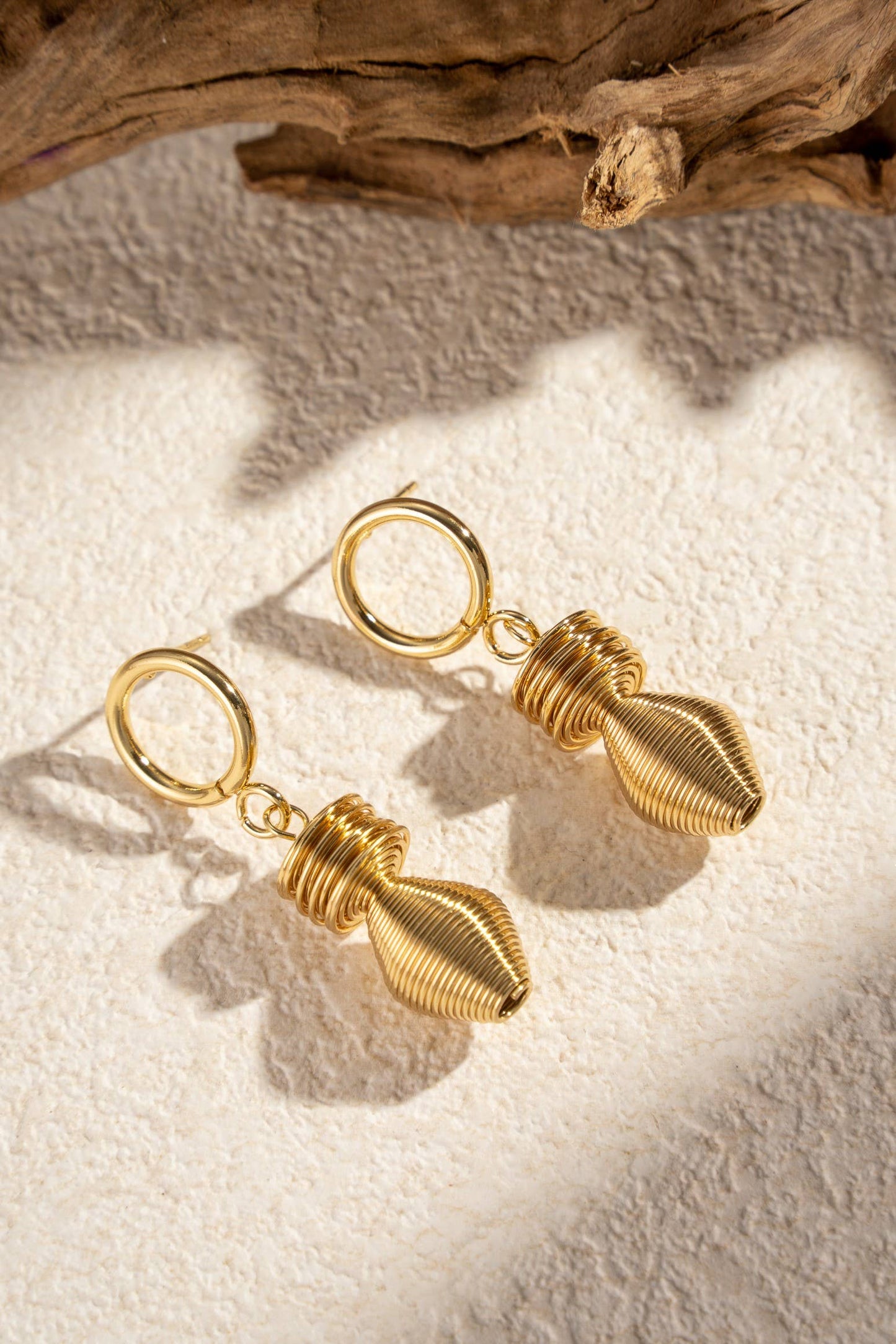 COSMOS - Twisted gold stainless steel earrings style