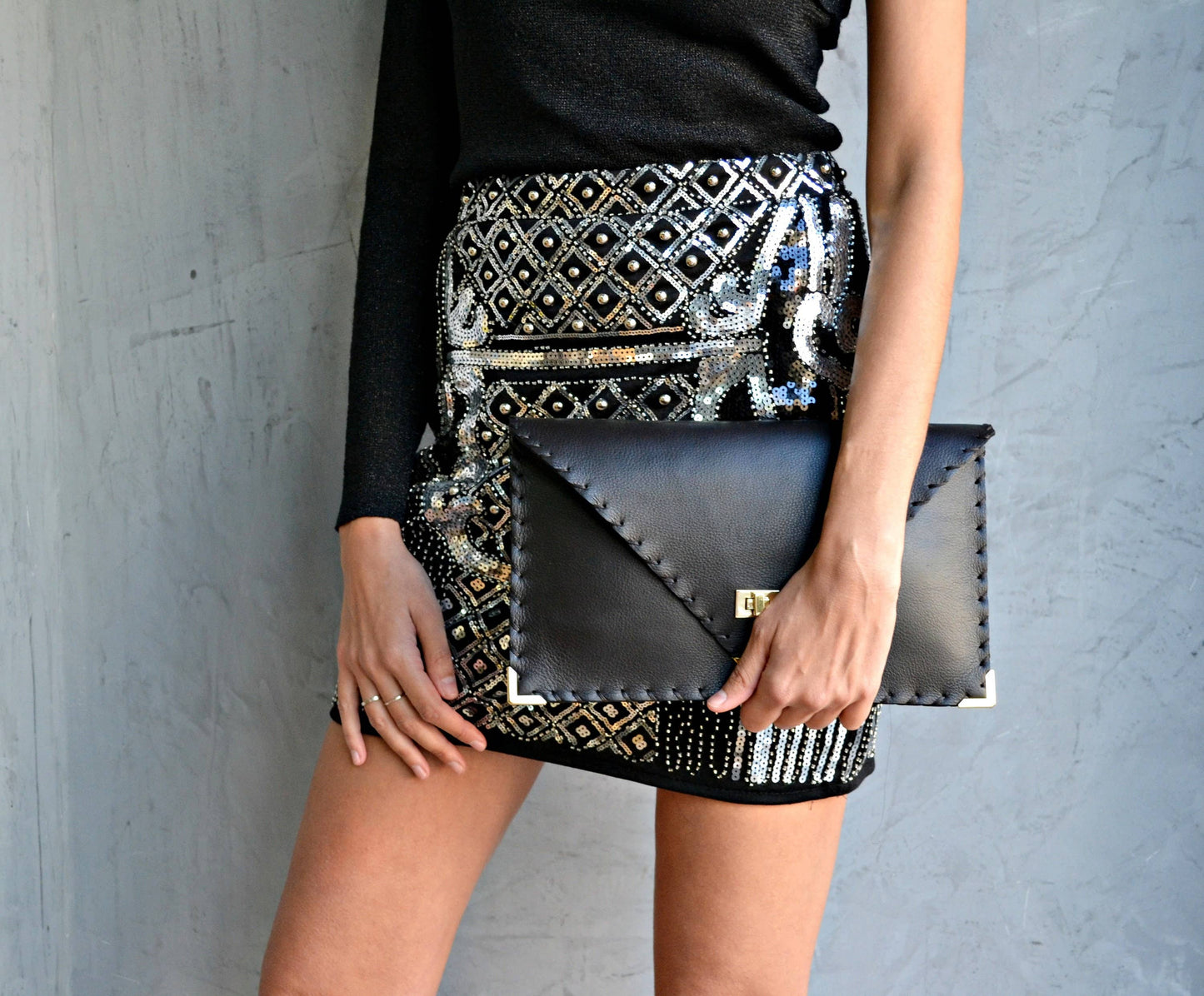 ANA KOUTSI - Symmetria black leather clutch bag: Silver / Small