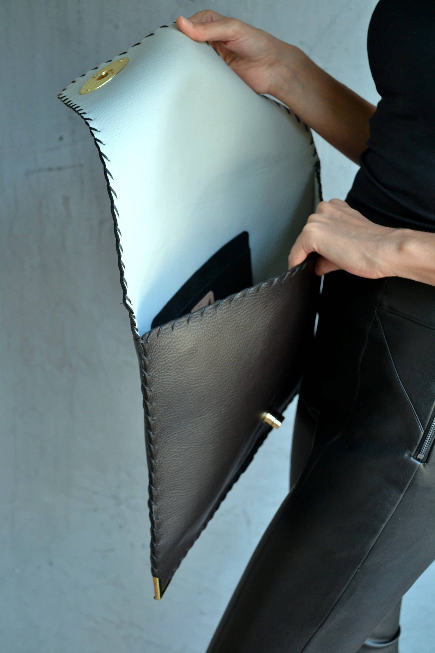 ANA KOUTSI - Symmetria black leather clutch bag: Silver / Small