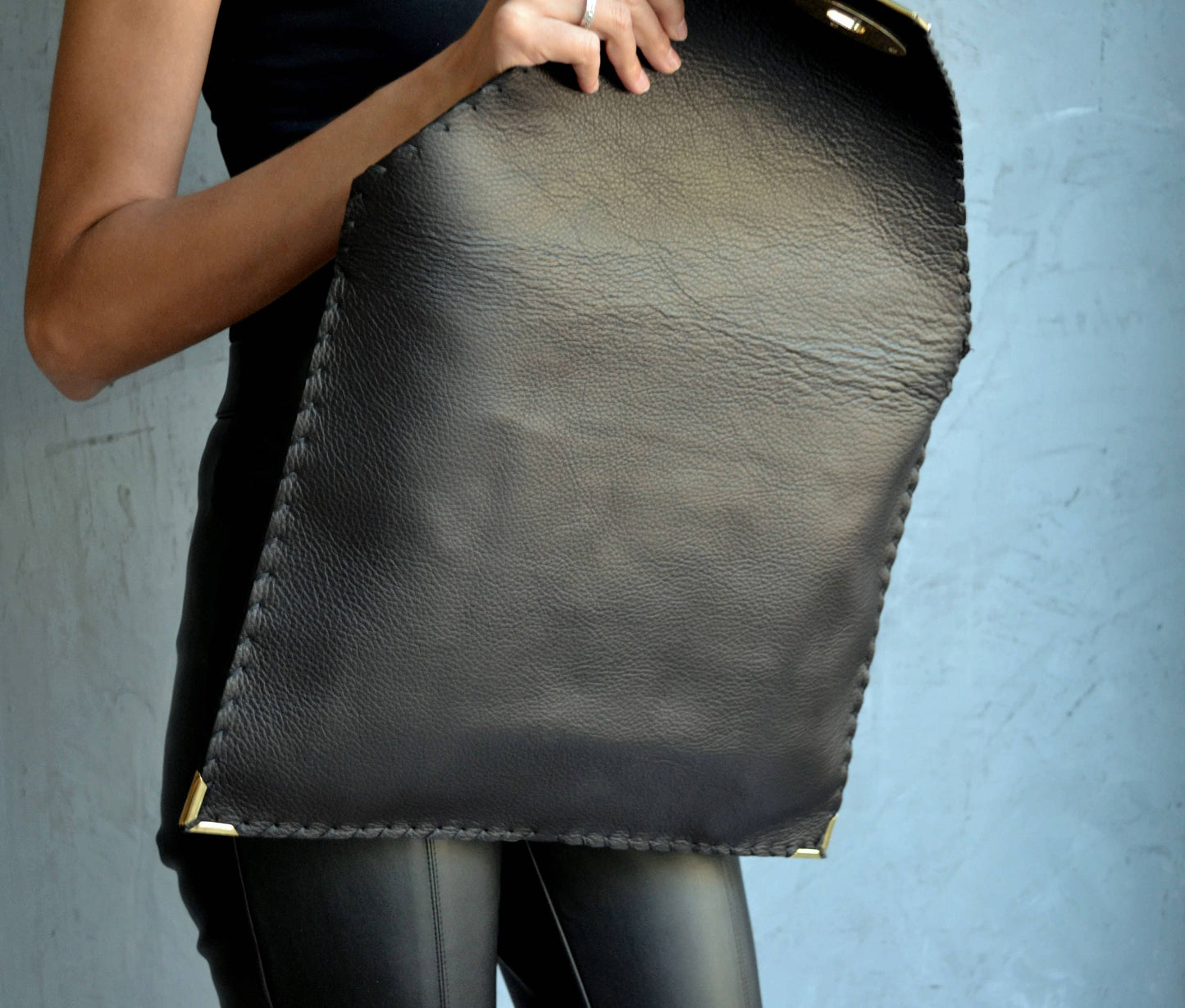 ANA KOUTSI - Symmetria black leather clutch bag: Silver / Small