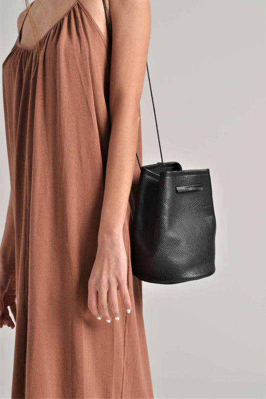 ANA KOUTSI - Ioli leather bucket bag in black