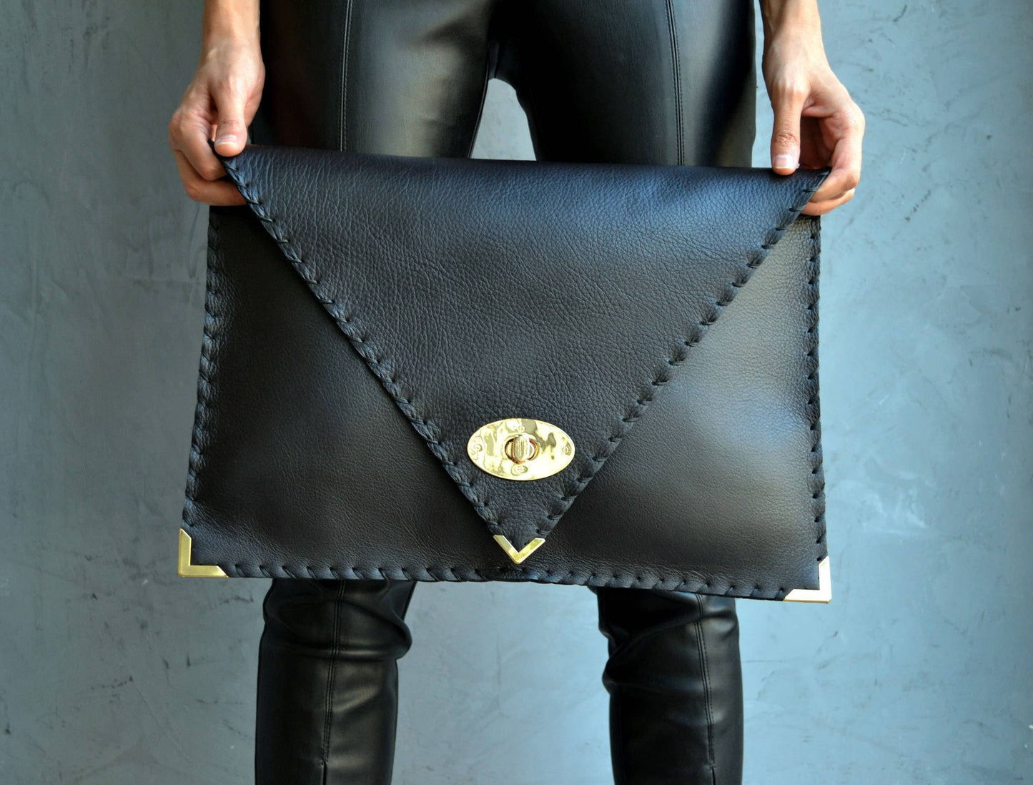 ANA KOUTSI - Symmetria black leather clutch bag: Silver / Small